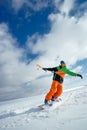 The sportsman on a snowboard runs kite Royalty Free Stock Photo