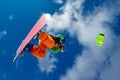 The sportsman on a snowboard runs kite Royalty Free Stock Photo