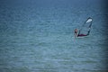 sportsman with wingfoil sailing, in the sea. Windsurfing, Fun in the ocean, Extreme Sport. Russia - July 25.2021 Royalty Free Stock Photo