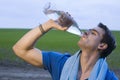 Sportsmann drinking water Royalty Free Stock Photo