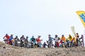 Sportsmen bikers ready to start a race down ski track in Gorky Gorod resort in Caucasus mountains