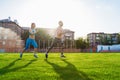 Sportsmen man and woman running in stadium. Healthy sport activity for adults. Young athletes in training, runner exercising.