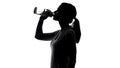 Sportswoman drinking beverage, keeping water balance after workout, healthcare