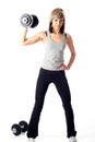 Sportswoman with dumbbells