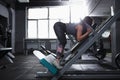 Sportswoman exercising at gym Royalty Free Stock Photo