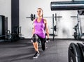Sportswoman exercising in gym Royalty Free Stock Photo
