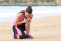 Sportswoman suffering knee ache after running