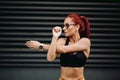 sportswoman warming up for running. Female runner stretching, preparing for training Royalty Free Stock Photo