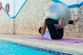 Sportswoman Working Out On Poolside