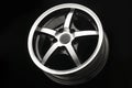 sporty alloy wheel black with polishing. side view close-up