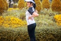 Sporty asian female suffering from pain in waist  injury after sport exercise running jogging and workout at park outdoor Royalty Free Stock Photo