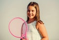 Sporty beauty. girl with tennis racquet. summer sport activity. energetic child. happy and cheerful. sporty game playing