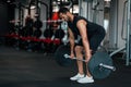 Sporty Black Man Lifting Heavy Barbell While Training At Gym Royalty Free Stock Photo