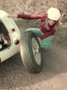 Sporty Blonde Changing Tire