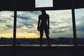 Sporty climber woman silhouette in urban surroundings Royalty Free Stock Photo