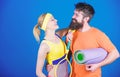 Sporty couple. Healthy lifestyle concept. Man and woman couple in love with yoga mat and sport equipment. Fitness Royalty Free Stock Photo