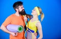 Sporty couple. Healthy lifestyle concept. Man and woman couple in love with yoga mat and sport equipment. Fitness Royalty Free Stock Photo