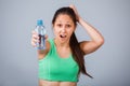 Sporty Female and bottle of water Royalty Free Stock Photo