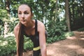 Sports girl starting to running outdoors. Royalty Free Stock Photo