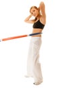 Sporty fit girl doing exercise with hula hoop. Royalty Free Stock Photo