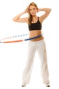 Sporty fit girl doing exercise with hula hoop. Royalty Free Stock Photo