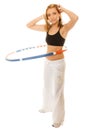 Sporty fit girl doing exercise with hula hoop. Royalty Free Stock Photo