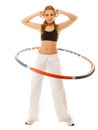 Sporty fit girl doing exercise with hula hoop. Royalty Free Stock Photo