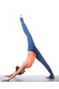 Sporty fit yogini woman practices yoga asana eka