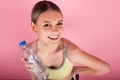 SPORTY FITNESS GIRL HOLDING BOTTLE OF WATER Royalty Free Stock Photo