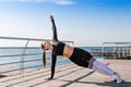 Woman doing planking yoga exercises Royalty Free Stock Photo