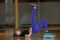 Sporty girl doing exercise on platform for an aerobics step Royalty Free Stock Photo