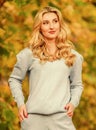 Sporty girl. Feel practicality and comfort. Model knitwear clothes leaves background. Woman enjoy autumn season in park