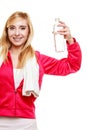 Sporty girl towel on shoulders drinking water Royalty Free Stock Photo