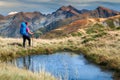 Sporty hiker woman in Fagaras mountains, Carpathians, Transylvania, Romania, Europe Royalty Free Stock Photo