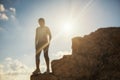 Sporty hiking girl on peak during sunset Royalty Free Stock Photo