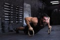 Sporty indian strong man doing push-ups on rings Royalty Free Stock Photo