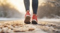 Fitness, sport and healthy lifestyle concept - close up of female feet running along winter road and snow Royalty Free Stock Photo