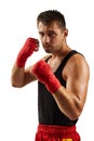 Sporty man in red sports bandages on his hands fighting