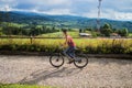 Sporty man riding a bicycle in the park Royalty Free Stock Photo