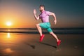 Sporty man runner running in summer sea beach. Attractive fit man run on sunset light, workout outdoors, jogging with Royalty Free Stock Photo