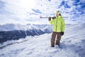 Sporty men with skis in a snow mountain resort Royalty Free Stock Photo