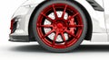 Sporty Red Alloy Wheel on Performance Car Royalty Free Stock Photo