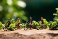 Sporty ride Miniature people riding bicycles with a vibrant green background