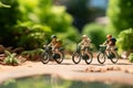 Sporty ride Miniature people riding bicycles with a vibrant green background