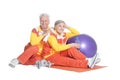 Sporty senior couple exercising on white background Royalty Free Stock Photo