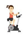 Sporty smiling girl in sportswear on exercise bike