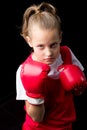 Sporty teenage girl doing boxing exercises Royalty Free Stock Photo