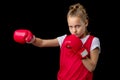 Sporty teenage girl doing boxing exercises Royalty Free Stock Photo