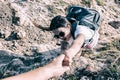 Sporty woman climbing on the cliff with help. Royalty Free Stock Photo