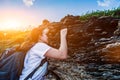 Sporty woman climbing on the cliff. Success and goal concept. Strong women power and healthy Royalty Free Stock Photo